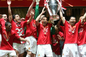 Manchester United's Rio Ferdinand and Ryan Giggs lift the Champions league trophy together