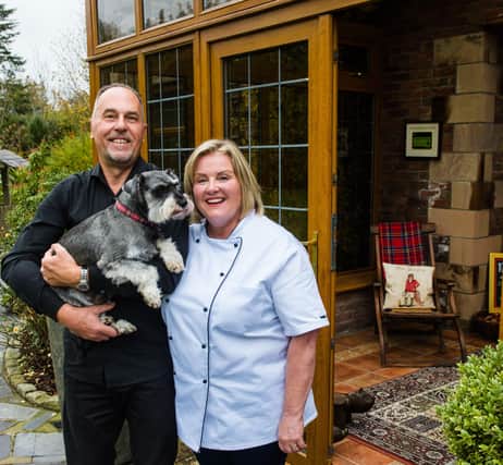 Joyce and Steve Brownlees with Murphy, their pet, at Blackwell House, near Scarva