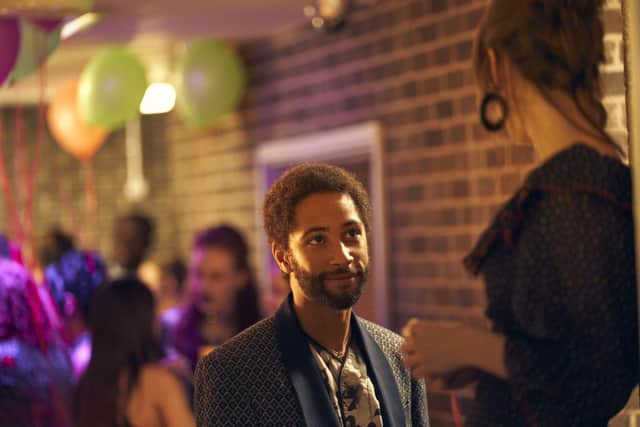 Marianne and Lukas chat at a party