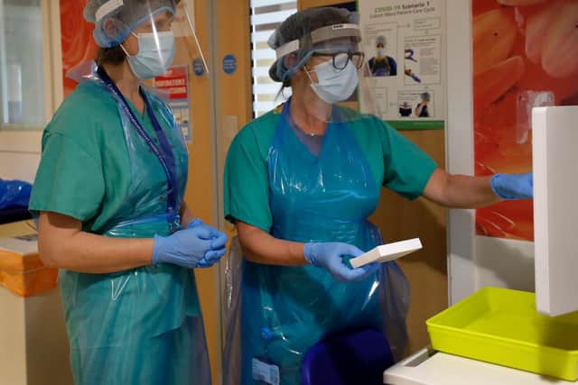 Medical professionals pictured on a COVID-19 ward. (Photo: PA Wire)
