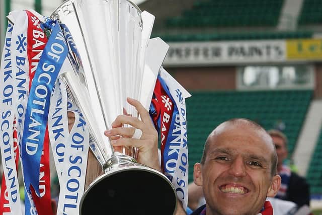 Alex Rae lifts the Scottish Premier League trophy