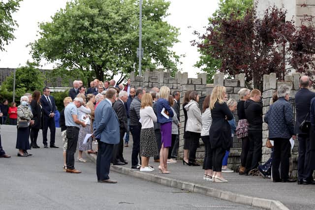 Members of the public and family turned out to pay their respects to Andrew Abraham