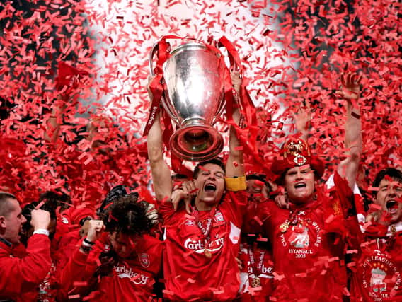 Liverpool captain Steven Gerrard lifts the UEFA Champions League trophy