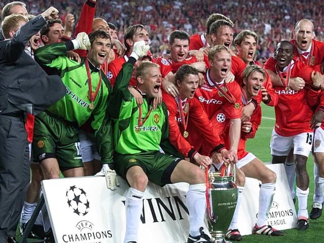 Manchester United celebrate after winning the European Cup in Barcelona, beating Bayern Munich 2-1. Pic by PA.