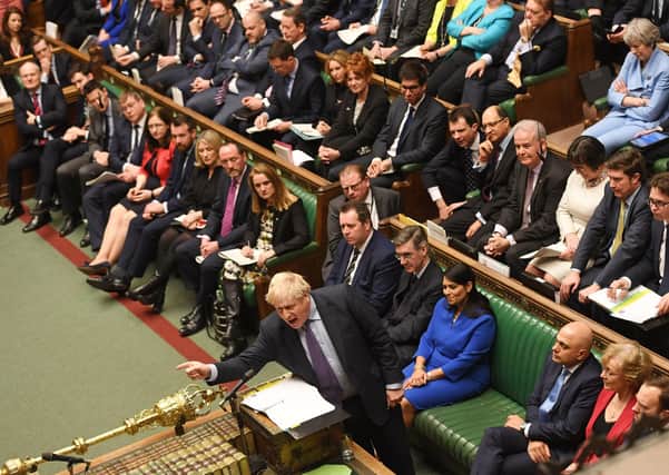 Boris Johnson, seen above in a packed House of Commons in February, before social distancing measures. Sammy Wilson writes: "The EU is not dealing with a minority government at Westminster any more. They have a prime minister who has a 'stomping majority' and who actually wants to be totally disentangled from the EU"