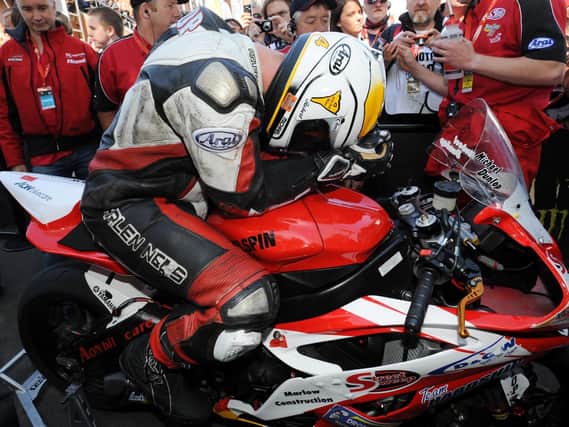 Michael Dunlop was dejected after narrowly missing out on victory in the second Supersport race at the Isle of Man TT in 2010.