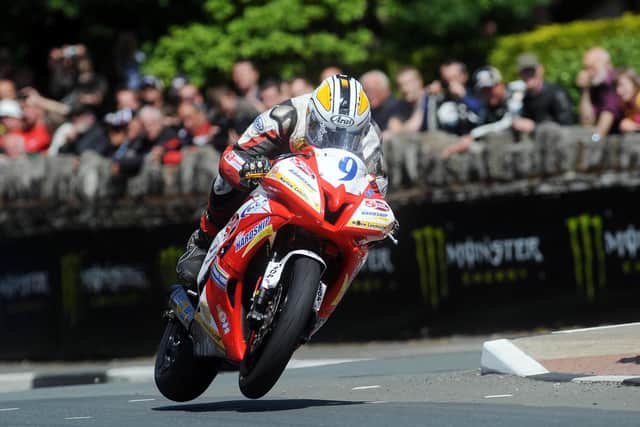 Michael Dunlop at St. Ninian's on the Street Sweep Yamaha R6 in the second Supersport race at the Isle of Man TT in 2010.