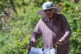 Former nurse Joan Rich, 101, walks through Allenby Park in Felixstowe, Suffolk, to raise money for NHS Charities Together. Picture: Joe Giddens/PA Wire