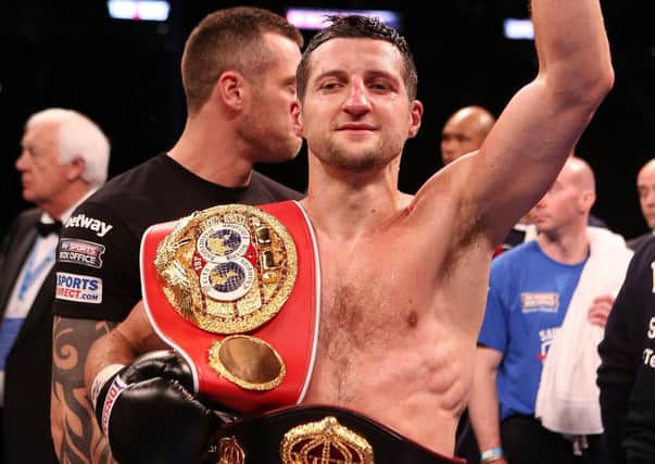 Carl Froch celebrates after knocking down George Groves during the IBF and WBA World Super Middleweight Title fight at Wembley Stadium, London in 2014. Pic by PA.