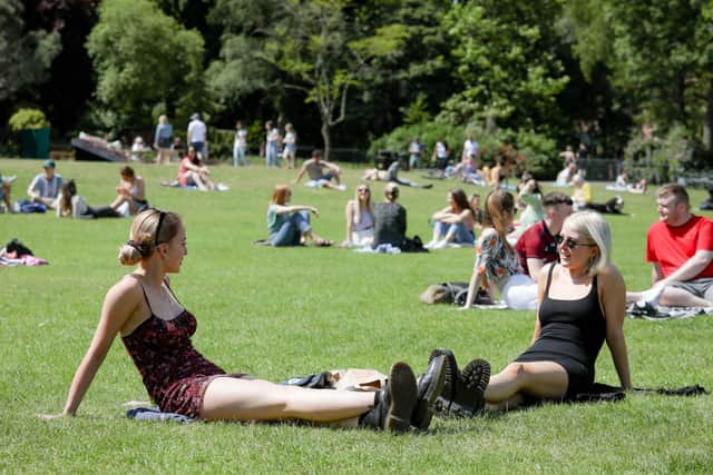 Friends enjoying the sunshine in Botanic Gardens, Belfast. (Photo: Presseye)