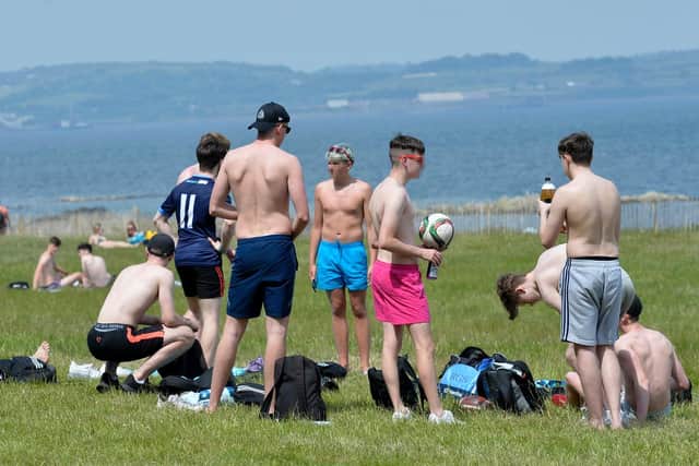 Young people pictured drinking and not adhering to social distancing guidelines in Crawfordsburn Country Park on Tuesday afternoon. (Photo: Presseye)