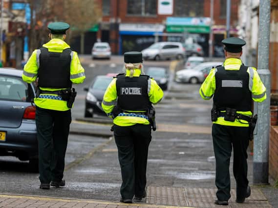 PSNI officers on a recent foot patrol in Belfast. (Photo: PA Wire)