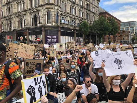 People participate in a Black Lives Matter protest rally march through Donegall Square in Belfast, in memory of George Floyd who was killed on May 25 while in police custody in the US city of Minneapolis. PA Photo. Picture date: Wednesday June 3, 2020. See PA story POLICE Floyd Belfast. Photo credit should read: David Young/PA Wire