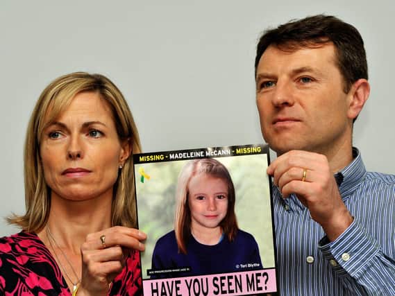The parents of Madeline McCann, Kate and Gerry McCann, hold an image of how police think the missing girl might have looked a few years after she disappeared. (Photo: PA Wire)