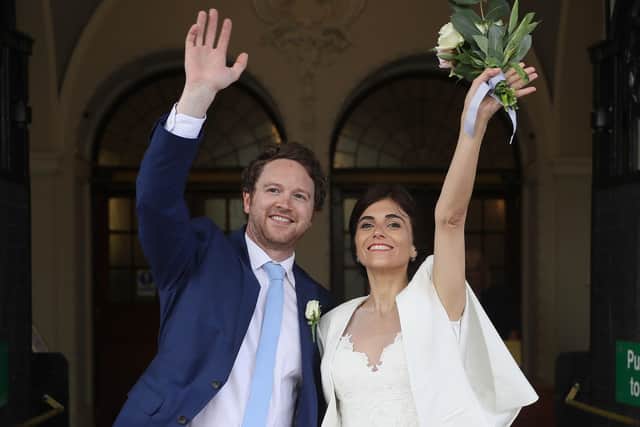 Michael McCaw, from Belfast, and Lucrecia Landeta Garcia, originally from Argentina, following their wedding ceremony at City Hall in Belfast., Photo: Brian Lawless/PA Wire