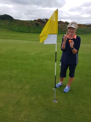 Anne savouring success on the second green.