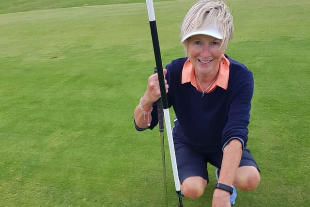 Anne celebrates a hole-in-one at Cairndhu.
