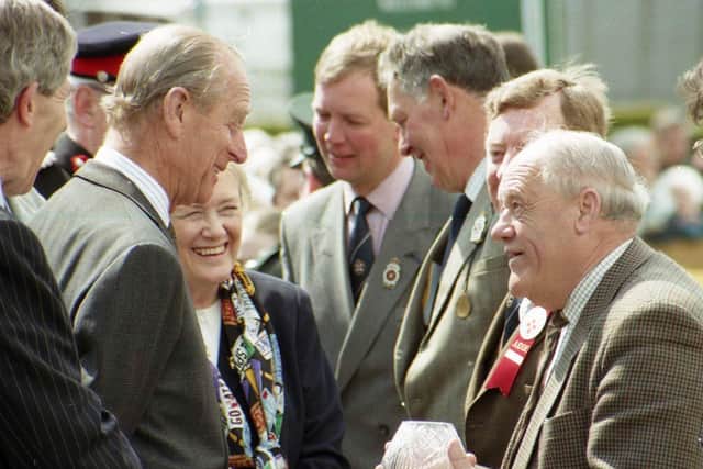The Duke of Edinburgh speaks to showgoers at the Balmoral Show in 1996. Picture: News Letter archives