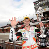 Ian Hutchinson celebrates his record five-wins-in-a-week feat at the 2010 Isle of Man TT.