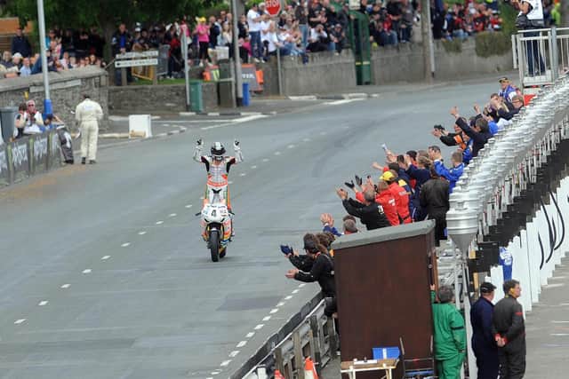 Ian Hutchinson crosses the line to win the Senior TT - his fifth win from five starts at the event in 2010.
