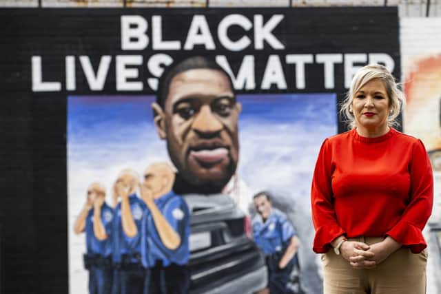 Deputy First Minister of Northern Ireland Michelle O'Neill of Sinn Fein at the newly painted mural to George Floyd in west Belfast. Kenny Donaldson asks of Sinn Fein: "You state that George Floyd’s life matters, that Black Lives matter, does this extend to those black innocents murdered by the Provisional IRA?" Photo: Liam McBurney/PA Wire