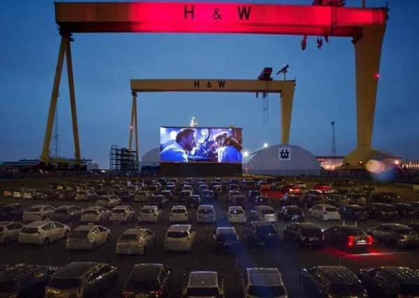 A mock-up of how the drive-in cinema experience against the backdrop of the Harland and Wolff shipyard should look