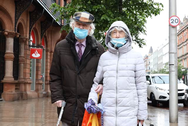 PACEMAKER PRESS BELFAST
12/6/2020
Shoppers battled rainy weather today as Belfast's non-essential shops opened their doors for the first time since the start of lockdown.
Pictured: Jim and Joan Leckey.
Photo Pacemaker Press