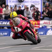 Joey Dunlop on the Honda VTR SP-1 at Quarterbridge in the 2000 Formula One race at the Isle of Man TT in 2000.