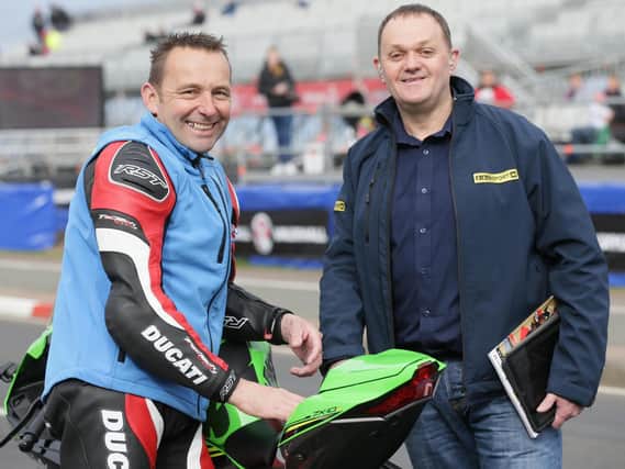 Phillip McCallen (right) at the North West 200 with rider liason officer, Steve Plater.