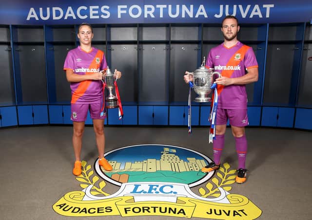 Linfield launched their new Umbro away kit last week for the start of the 2020/2021 season at Windsor Park. Ladies player Kelsie Burrows and Linfield club captain Jamie Mulgrew are pictured in the new kit.