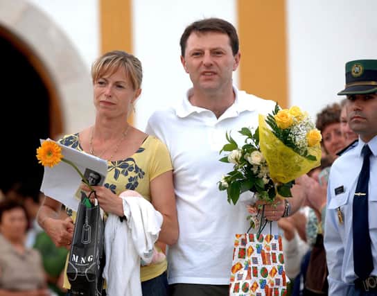 File photo dated 12/05/07 of Gerry and Kate McCann walking from the local church in Praia Da Luz, Portugal. Balloons were released after the catholic service on the fourth birthday of their missing daughter Madeleine McCann. A German prisoner has been identified as a suspect in the disappearance of Madeleine, detectives have revealed. The Metropolitan Police have not named the man, 43, who is described as white with short blond hair, possibly fair, and about 6ft tall with a slim build.