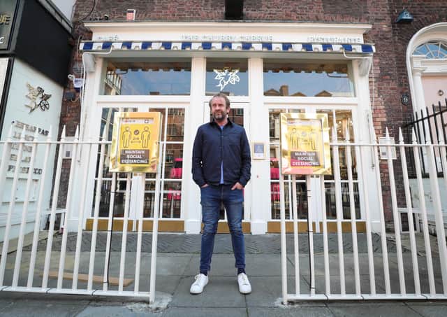 Press Eye - Belfast - Northern Ireland - 15th June 2020 -  Eamon McCusker, owner of the Chubby Cherub cafe in Belfast city centre prepares for opening in anticipation of being allowed to re-open for business in the next few weeks