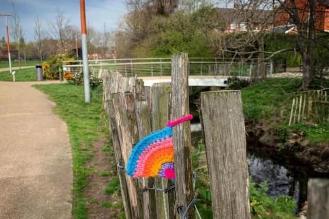 A knitted rainbow on Connswater Community Greenway. Pic by EastSide Greenways