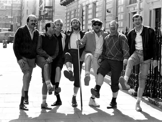 Pop stars Chas 'n' Dave right on cue for a knees up with the match room mob in London to announce the release of their new song 'Snooker Loopy'. The mob are snooker stars (from left) Willie Thorne, Tony Meo, Terry Griffiths, Dennis Taylor and Steve Davis.
