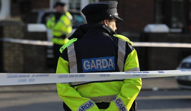 A Garda police officer has been shot dead