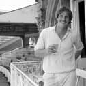 England's Ian Botham celebrates with a drink and a cigarette after taking eight wickets for 34 runs in Pakistan's second innings during 1978. Pic by PA.