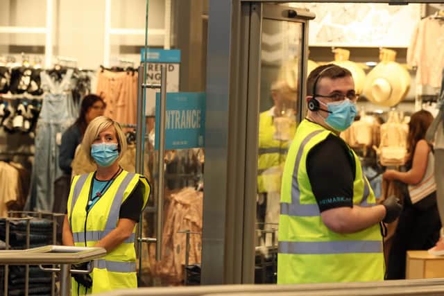 Primark staff in the Belfast city centre store as it opens its doors to customers for the first time since coronavirus lockdown restrictions were imposed in March.