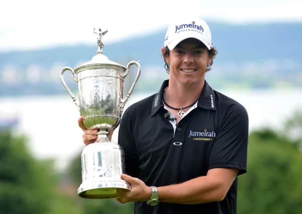 Newly-crowned US Open champion Rory McIlroy poses with the trophy in 2011 at Holywood Golf Club. Pic by PA.