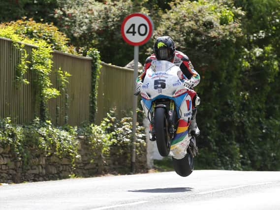 Bruce Anstey at Ballacrye on the Valvoline Padgett's Honda on his way to victory in the 2015 Superbike race at the Isle of Man TT.