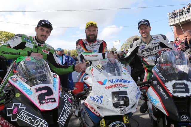 The 2015 Superbike TT top three of Bruce Anstey (centre), runner-up Ian Hutchinson (left) and James Hillier.