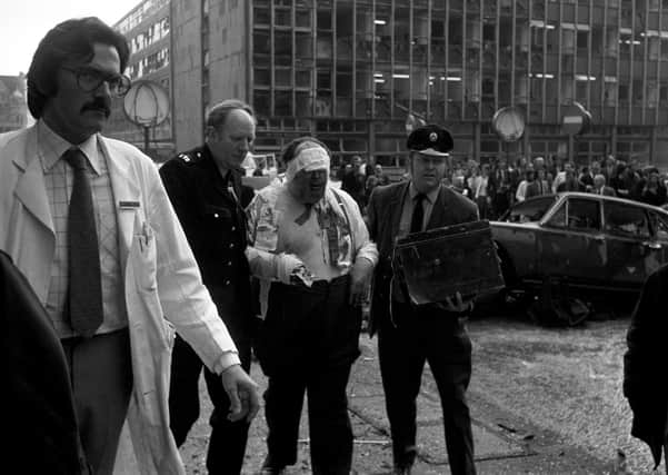 Barrister James Crespi is led away wounded after being hurt by a bomb outside the Old Bailey in London March 8,1973. Gerry Kelly got a life sentence for the bombing (one man died of a heart attack)