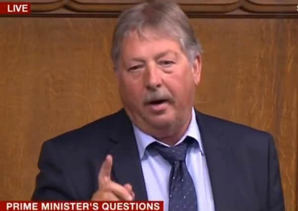 Sammy Wilson MP challenges the Prime Minister about claims that Larne port must prepare to become a border control post. (Photo: BBC)