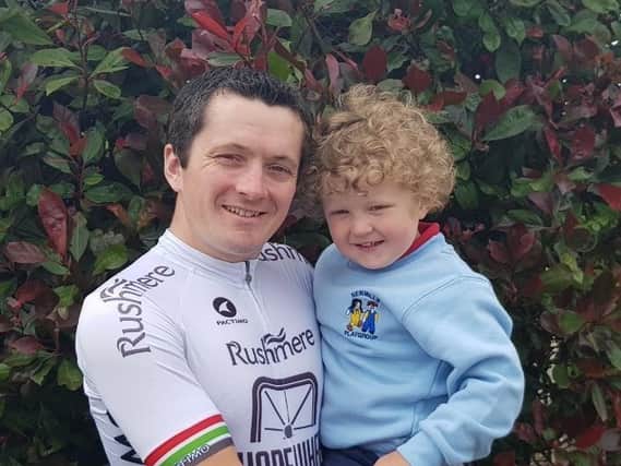 John Robinson with son Ethan, who attends the playgroup.