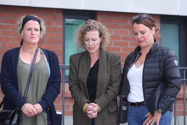 Pictured from left to right are Shona Donohoe, Fiona Donohoe the mother of Noah Donohoe, and Niamh Donohoe outside Musgrave Police Station in Belfast. (Photo: PA Wire)