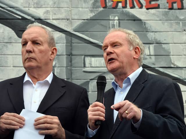 Bobby Storey with Martin McGuinness at a protest on the Falls Road, west Belfast in 2014, over the arrest of Gerry Adams