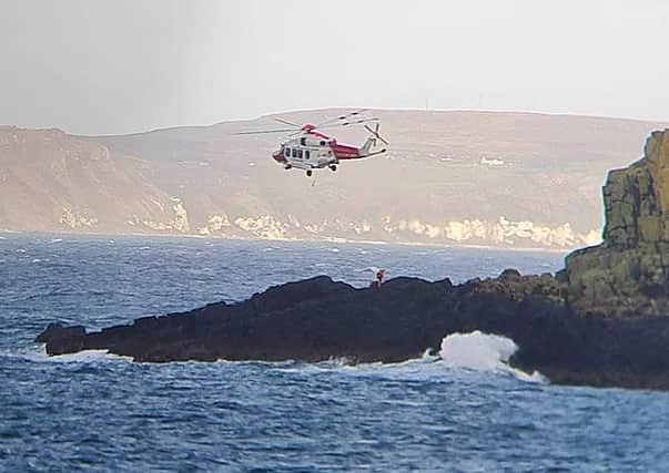 A rescue operation near Ballintoy Co Antrim this afternnon after two paddle boarders were rescued from high winds, the alarm was raised around 15.30. Coastguard teams from Ballycastle and Coleraine attended the incident along with lifeboats from Redbay and Portrush, Police Helicopter and a Coastguard rescue helicopter. Pic McAuley Multimedia