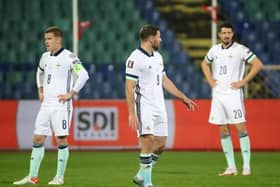 Northern Ireland's Steven Davis, Conor Washington and Craig Cathcart look dejected after Bugaria's second goal. Photo by William Cherry/Presseye