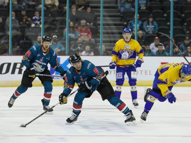 Belfast Giants’ JJ Piccinich with Fife Flyers’ Greg Chase