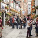People socialise in the Cathedral Quarter of Belfast, home to a number of pubs and restaurants