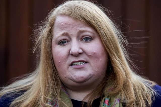 Justice Minister Naomi Long said she 'liked' the tweet about Denis Hutchings by accident.